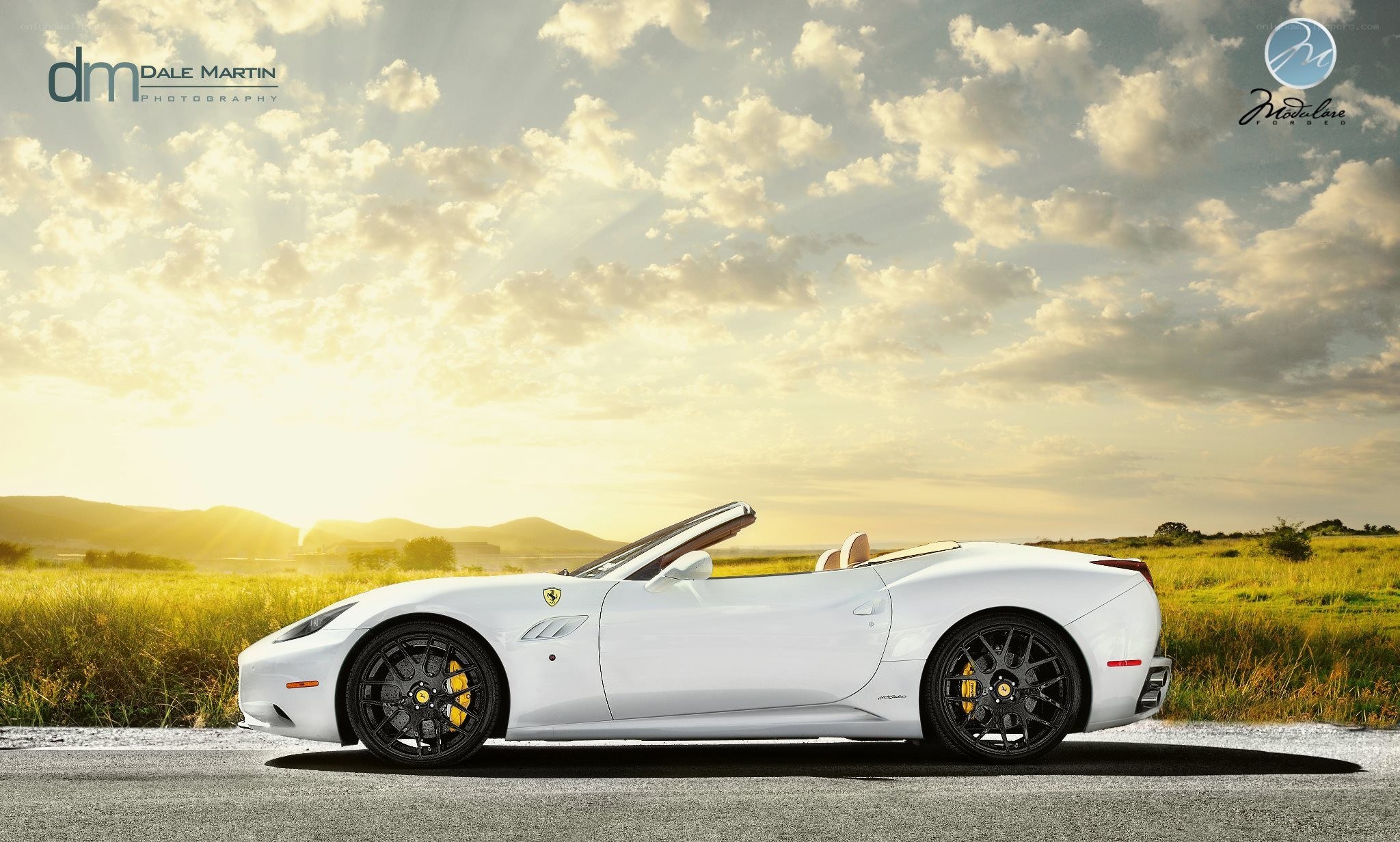 White Ferrari convertible on road