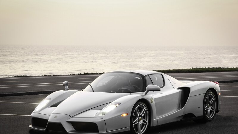 White Ferrari Enzo by the sea