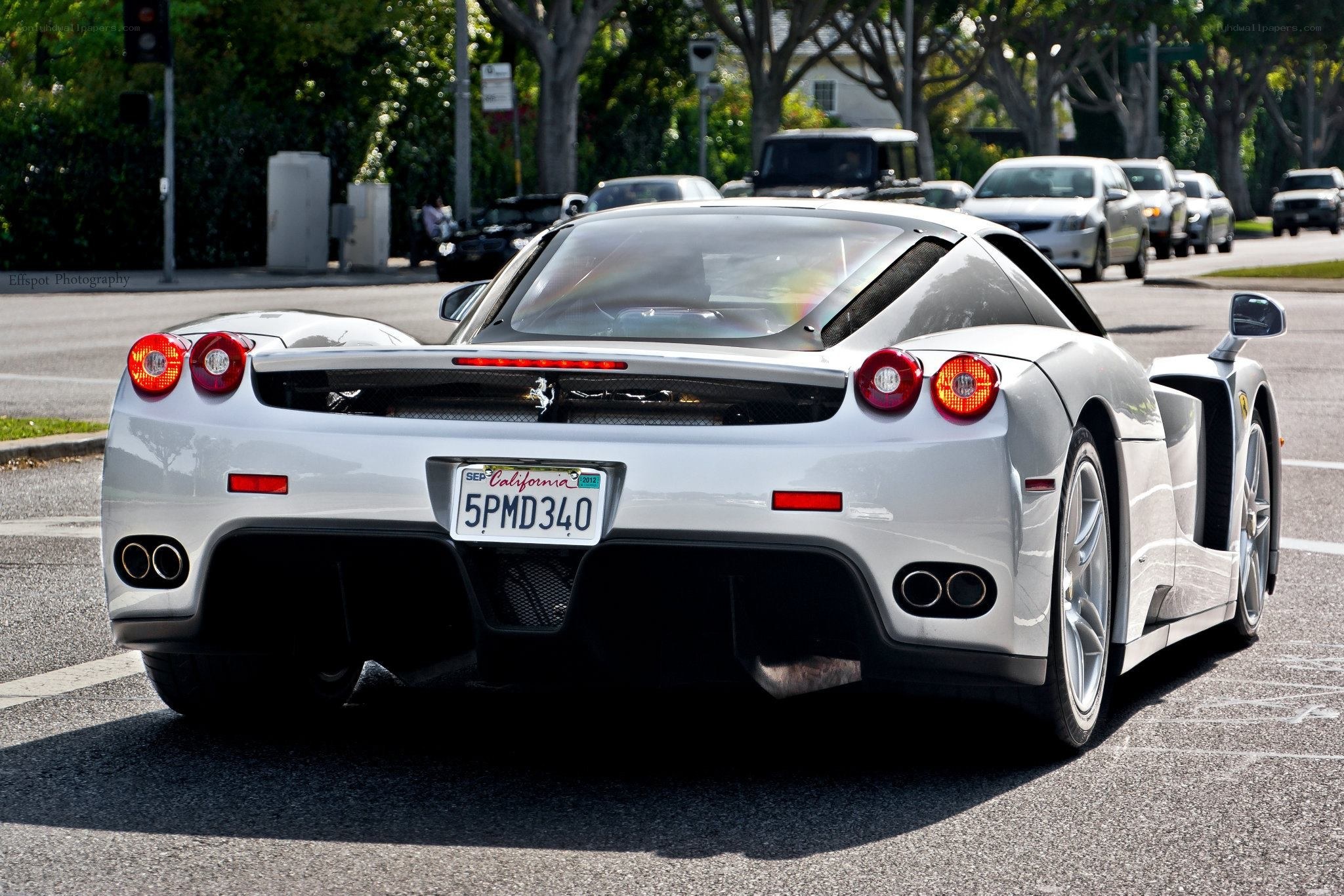 white ferrari enzo on street