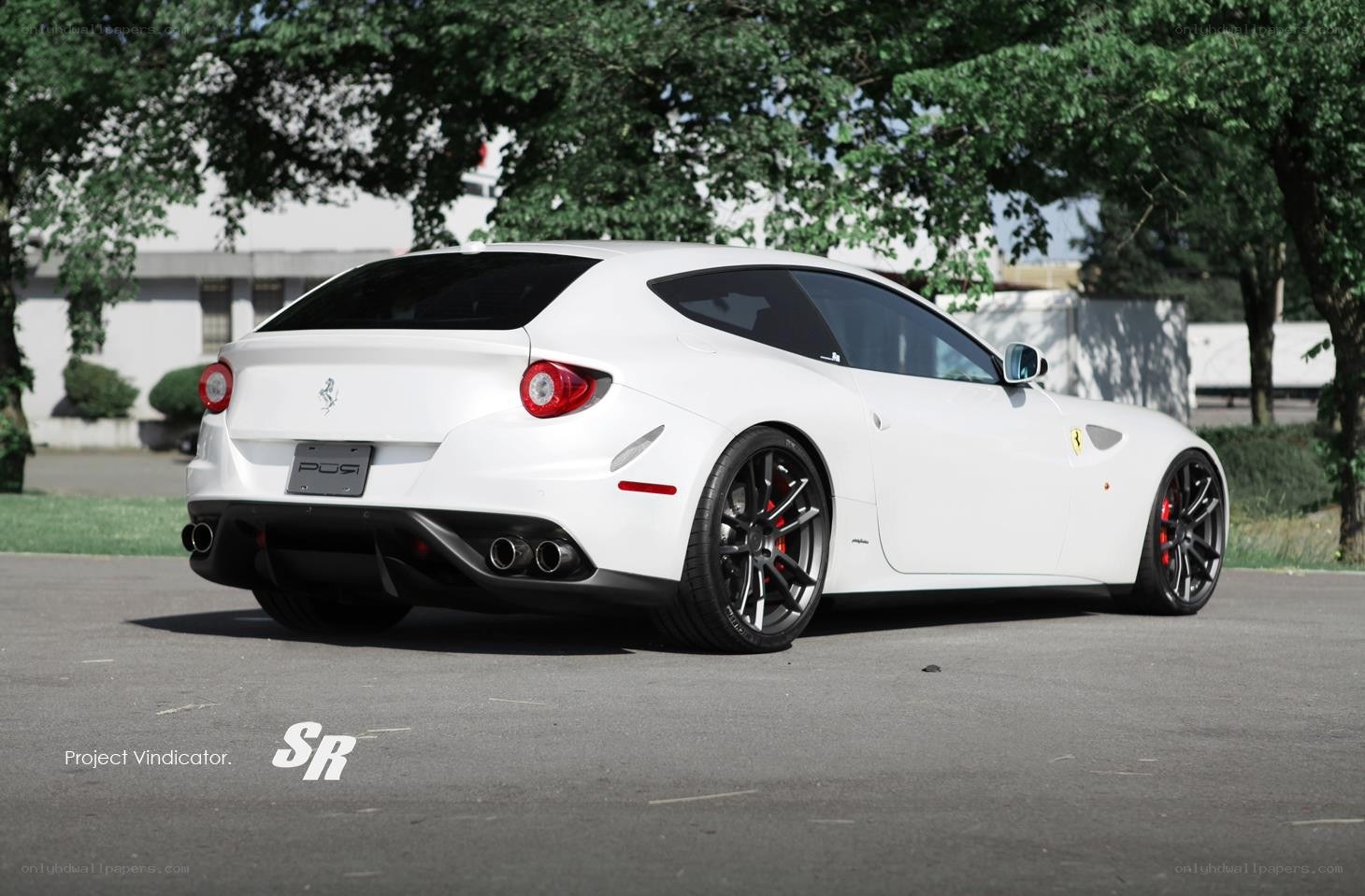 White Ferrari FF parked outside