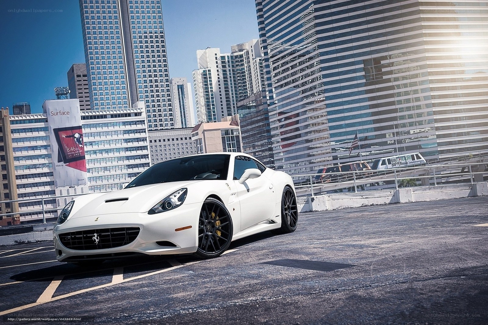 White Ferrari in city parking lot