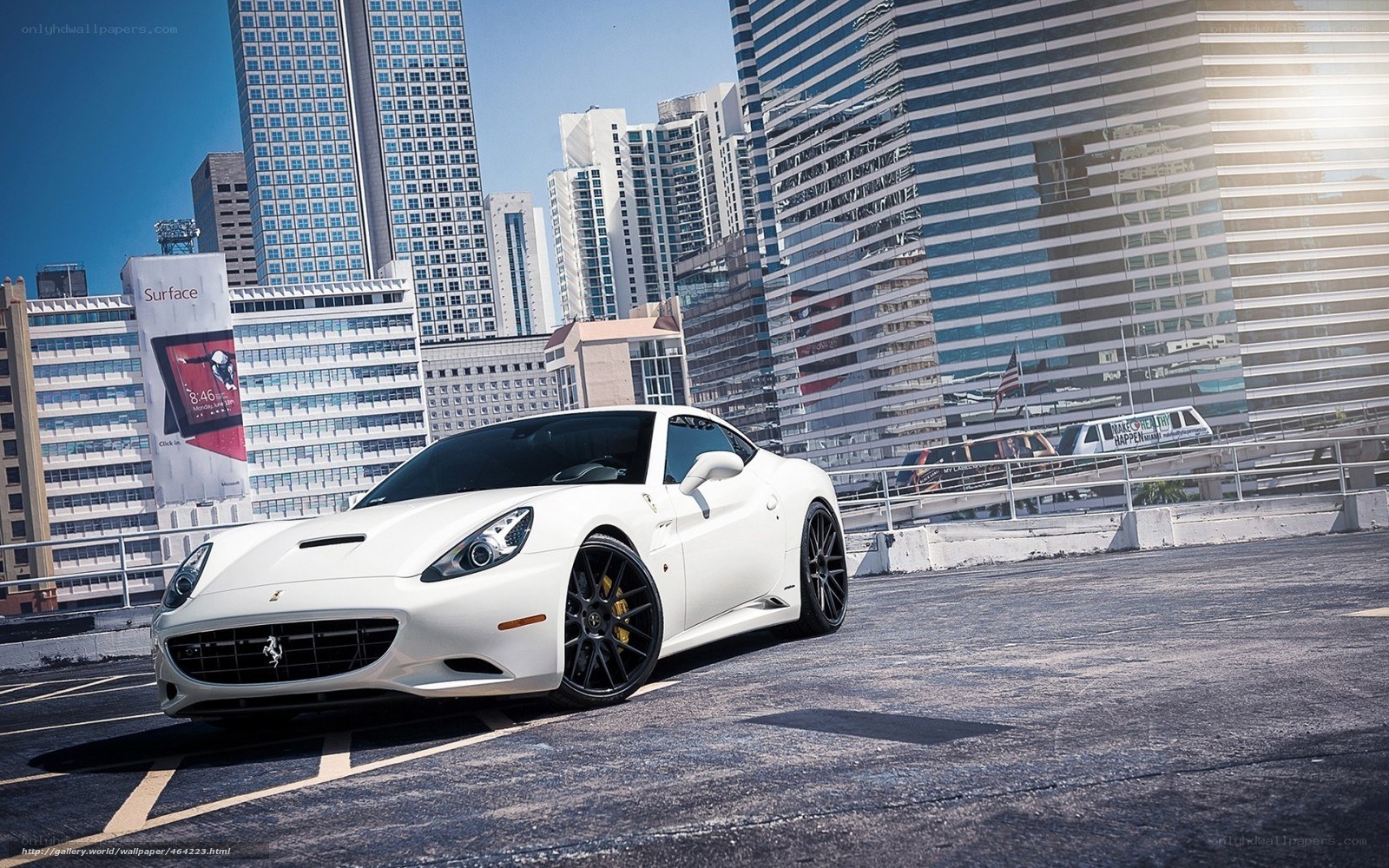 White Ferrari in city parking