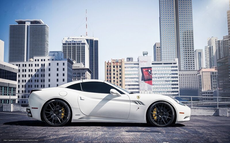 White Ferrari in cityscape