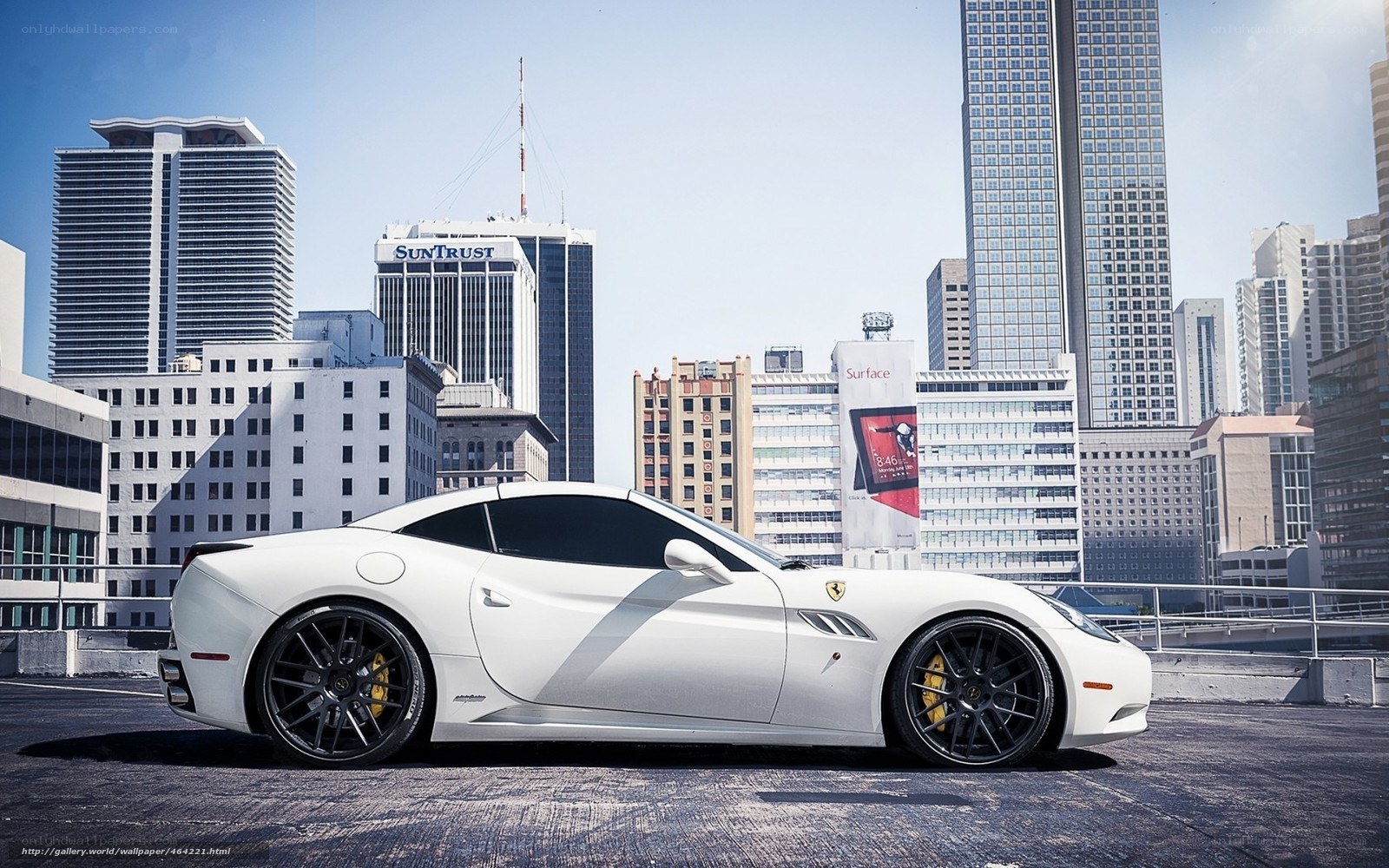 White Ferrari in cityscape