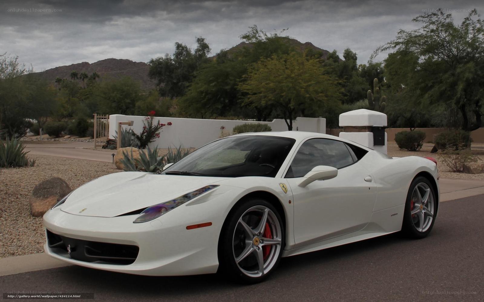 white ferrari in desert setting