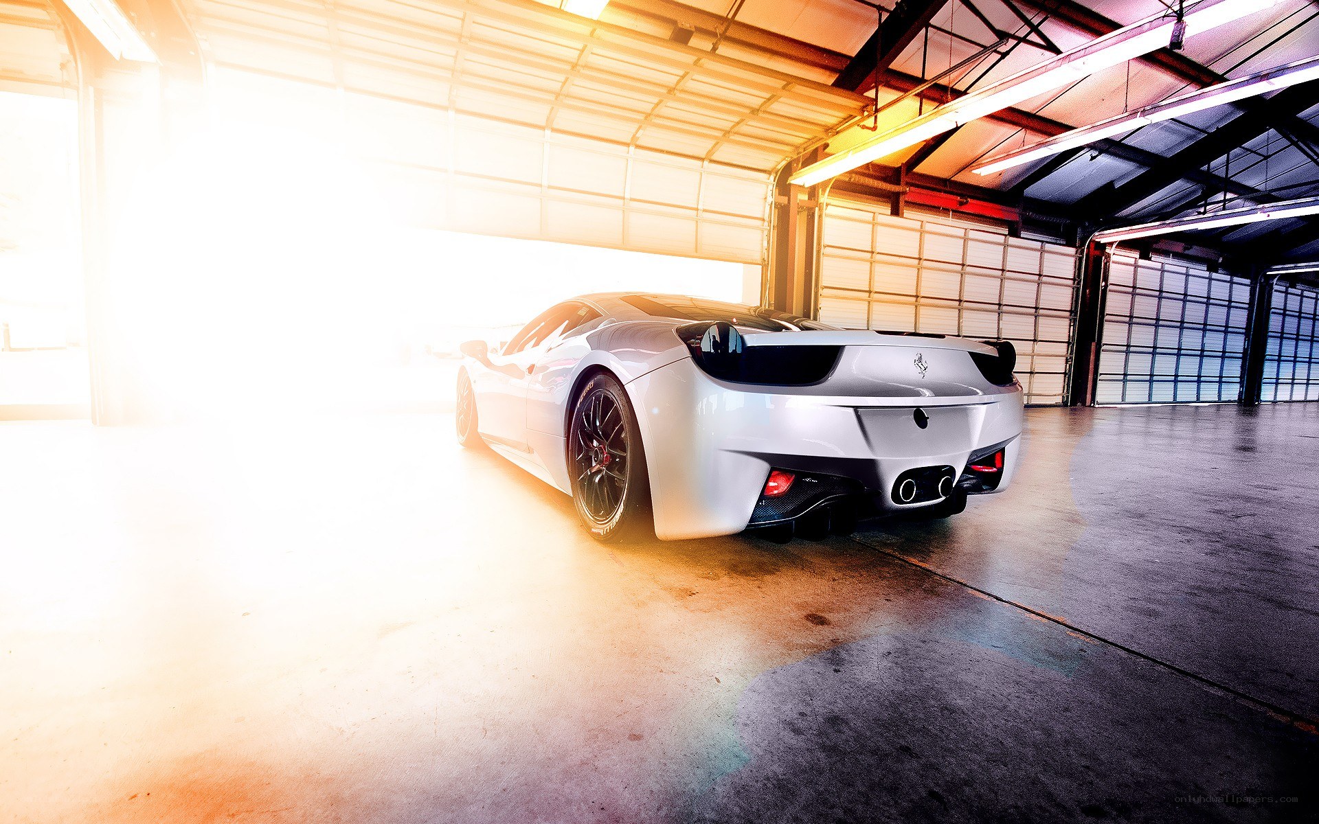 white ferrari in garage