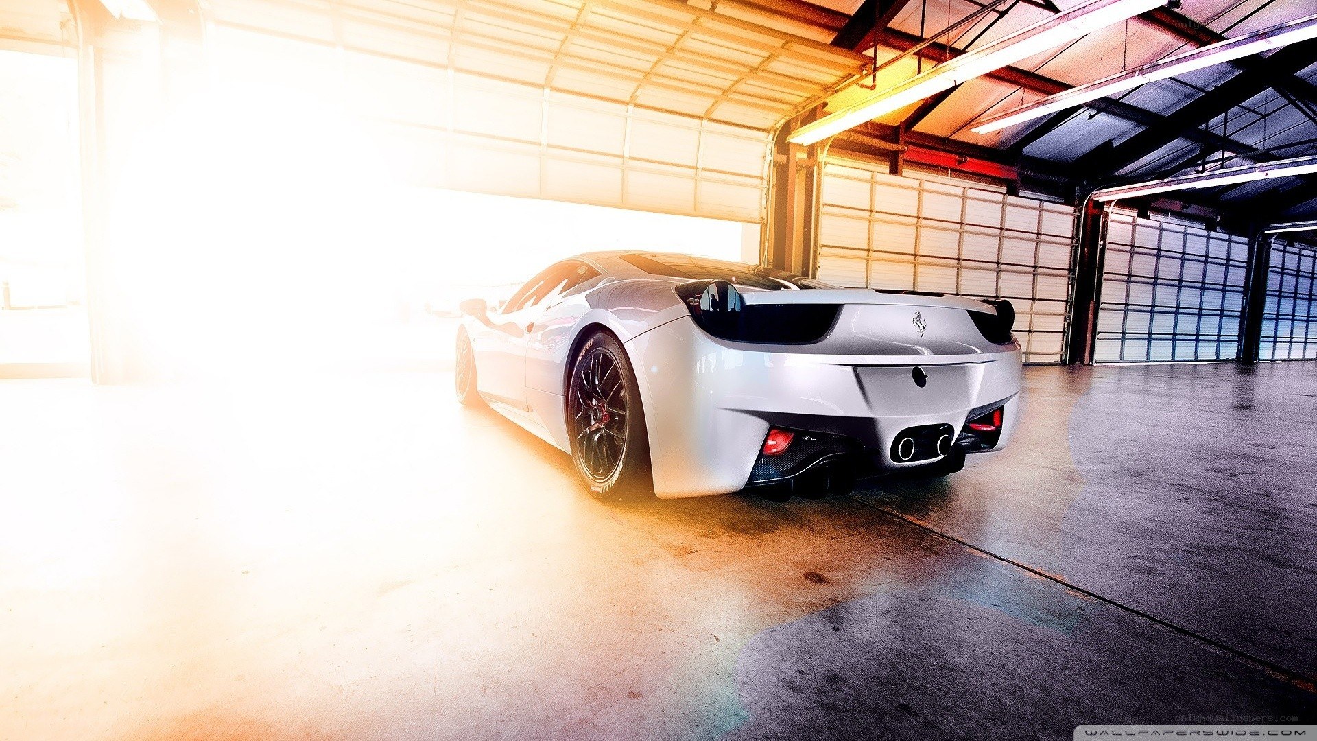 white ferrari in garage