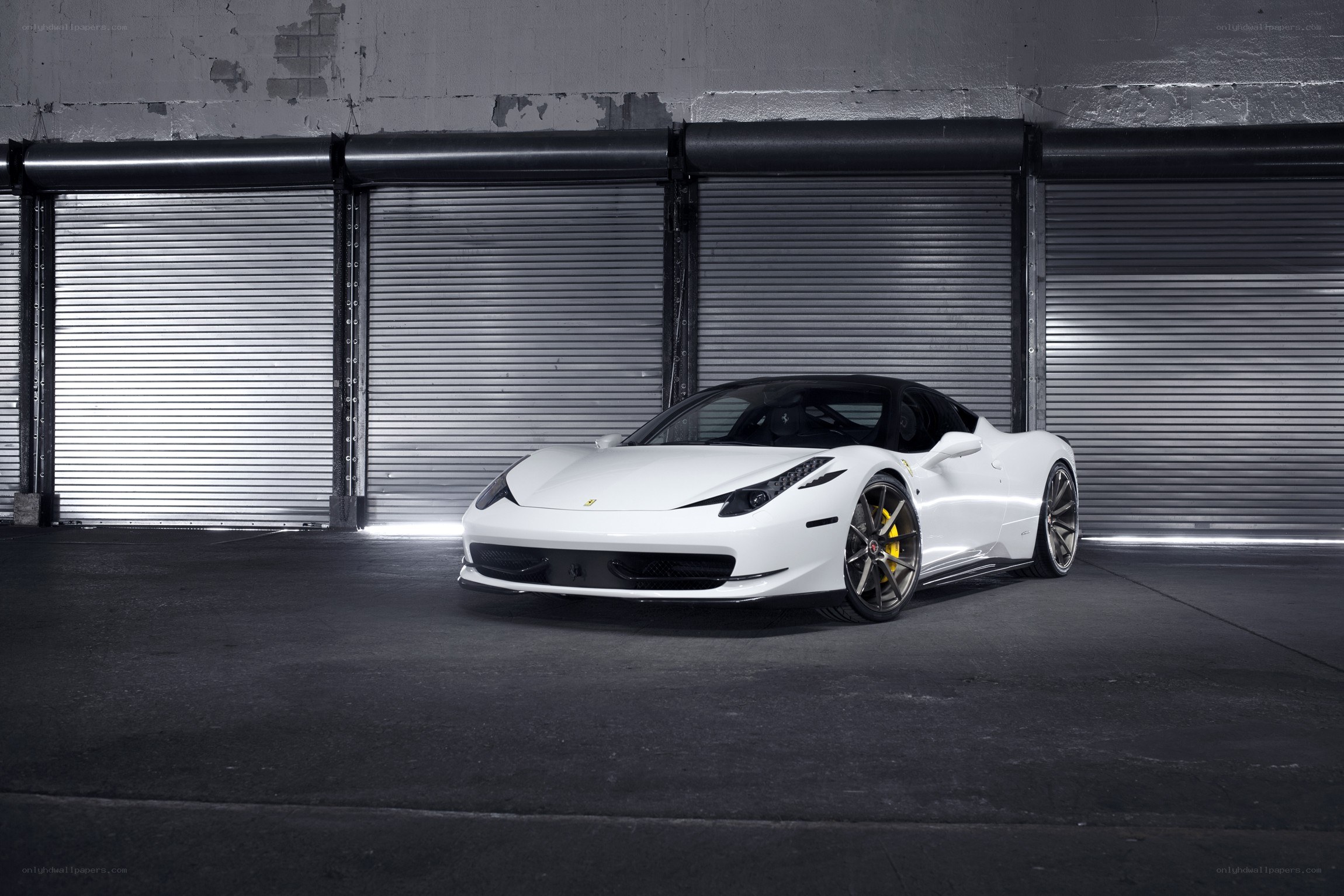 White Ferrari in garage