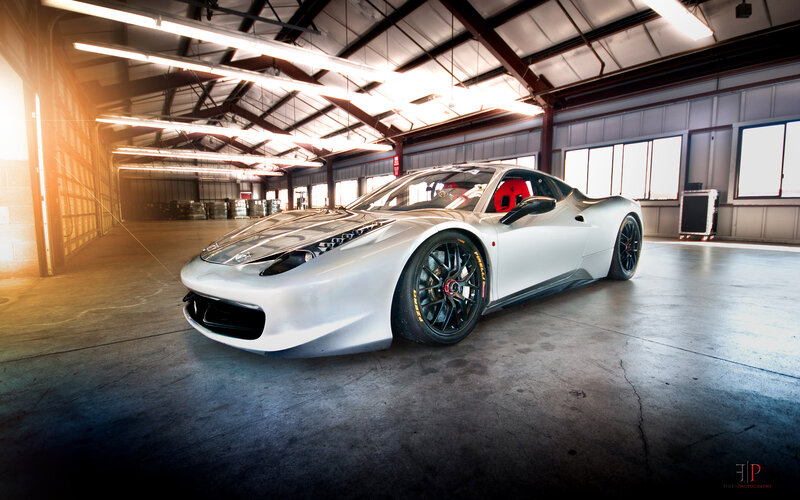 White Ferrari in Garage — Silver