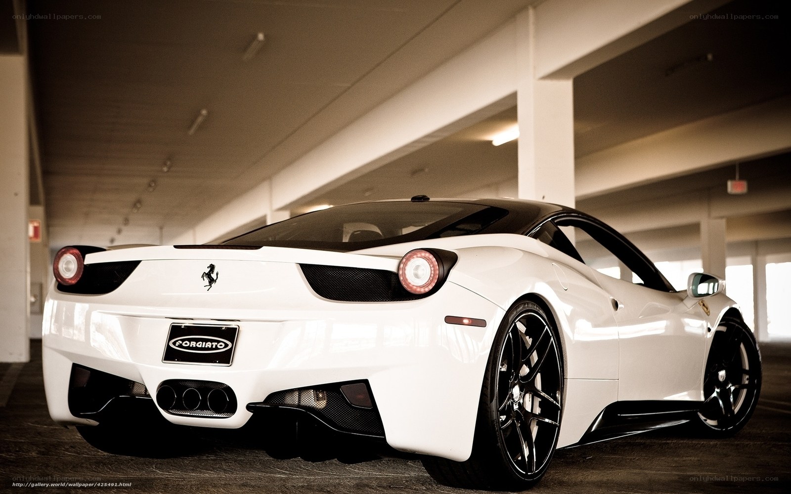 White Ferrari in parking garage