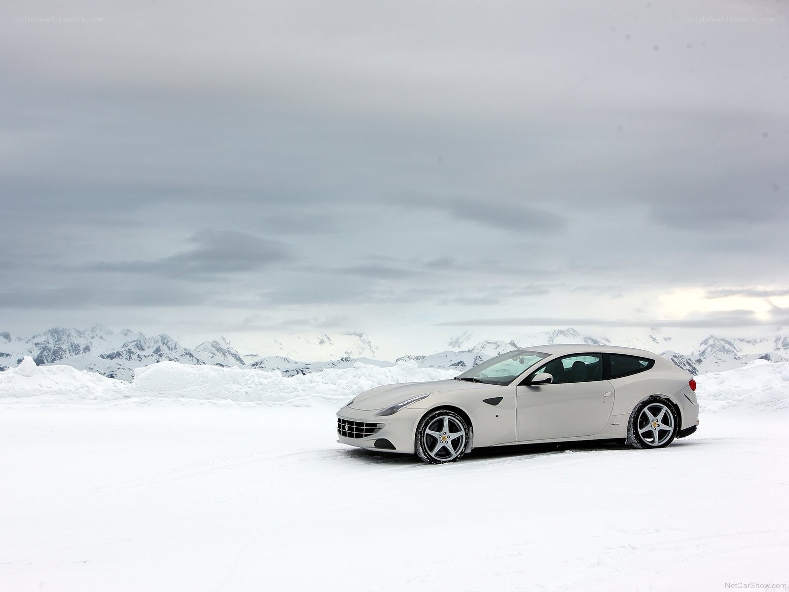 White Ferrari in snowy landscape