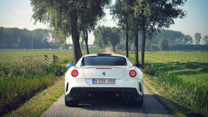 White Ferrari on a country road