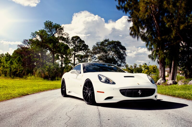 White Ferrari on a country road