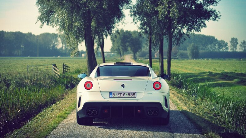 White Ferrari on a country road