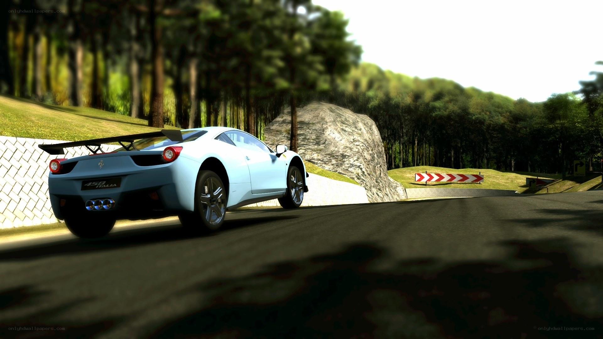 white ferrari on a racetrack