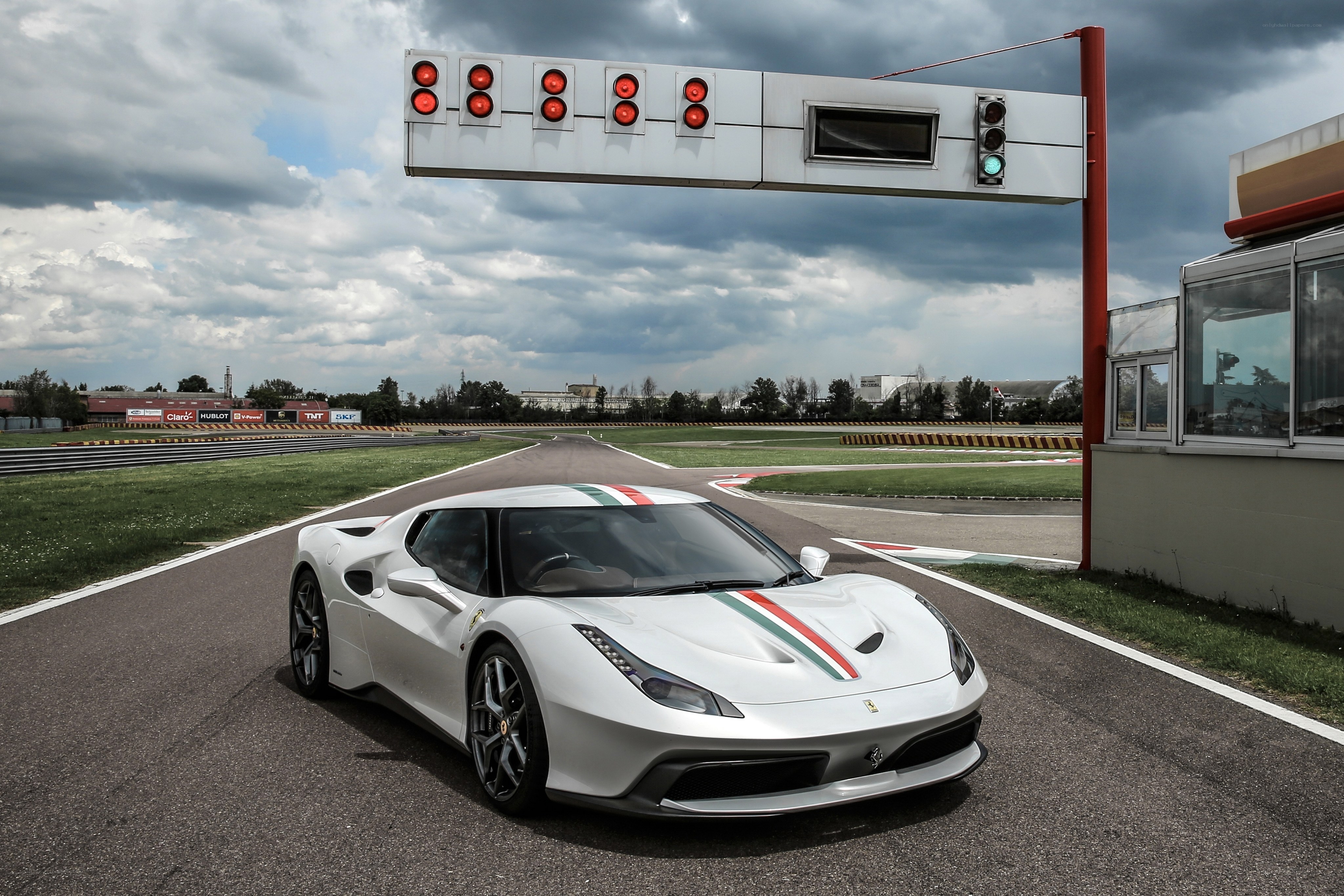 White Ferrari on a racetrack