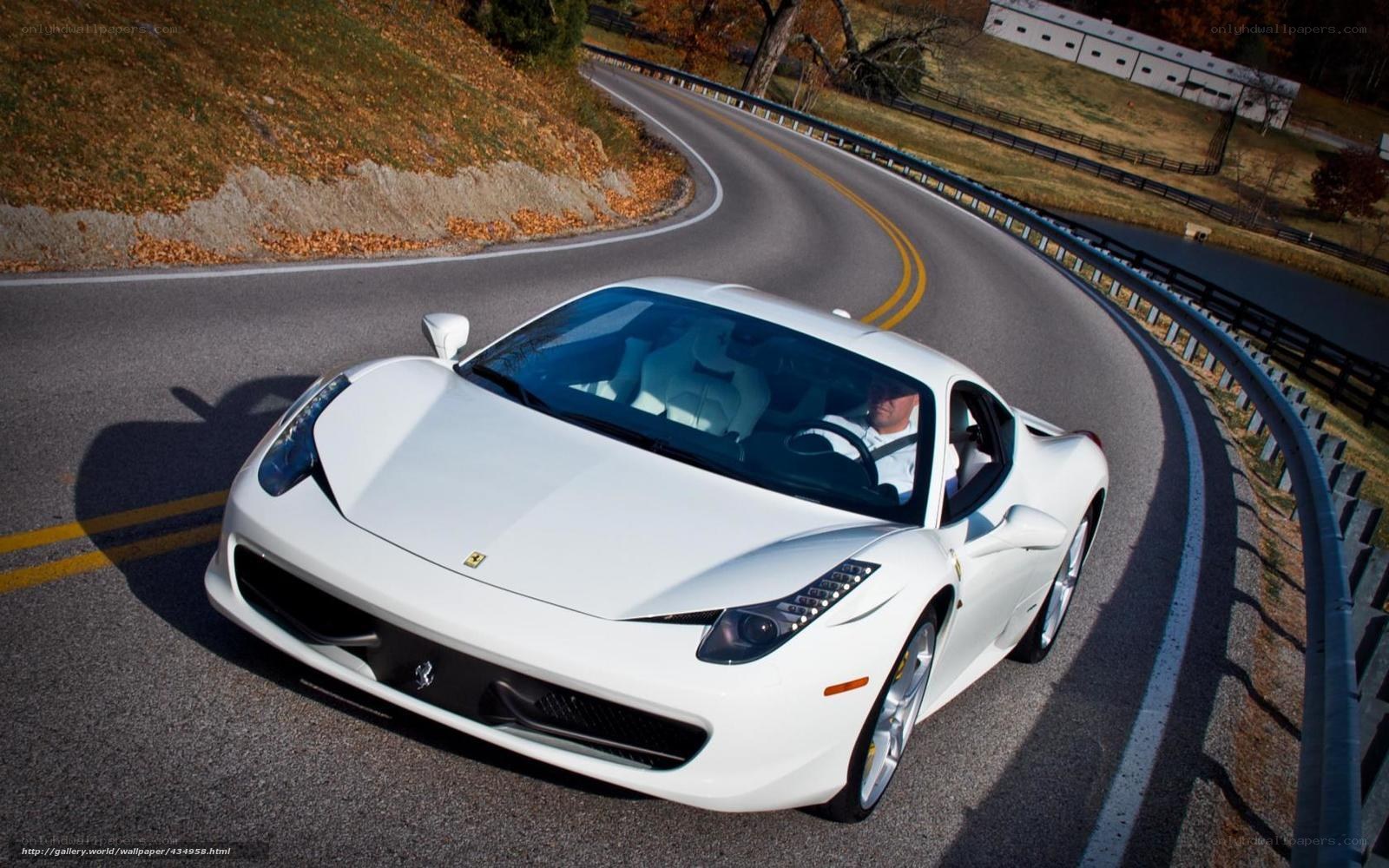 White Ferrari on a winding road
