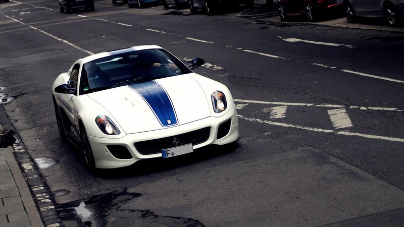 White Ferrari on city street