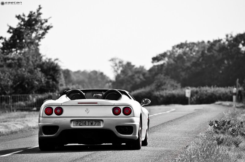 white ferrari on country road