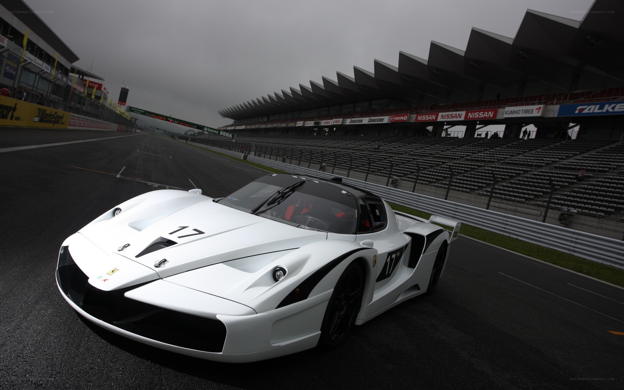 White Ferrari on racetrack