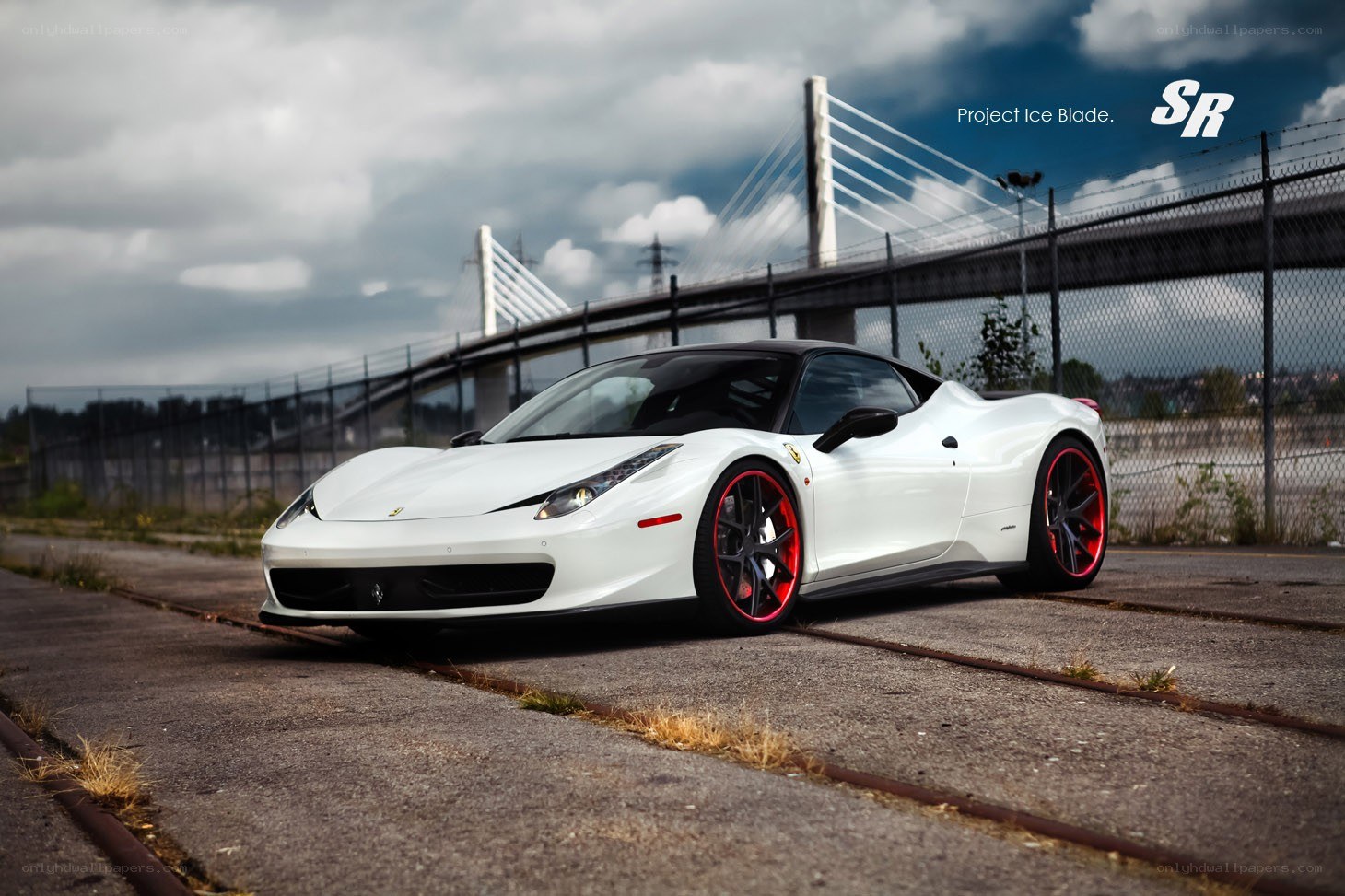 White Ferrari on train tracks