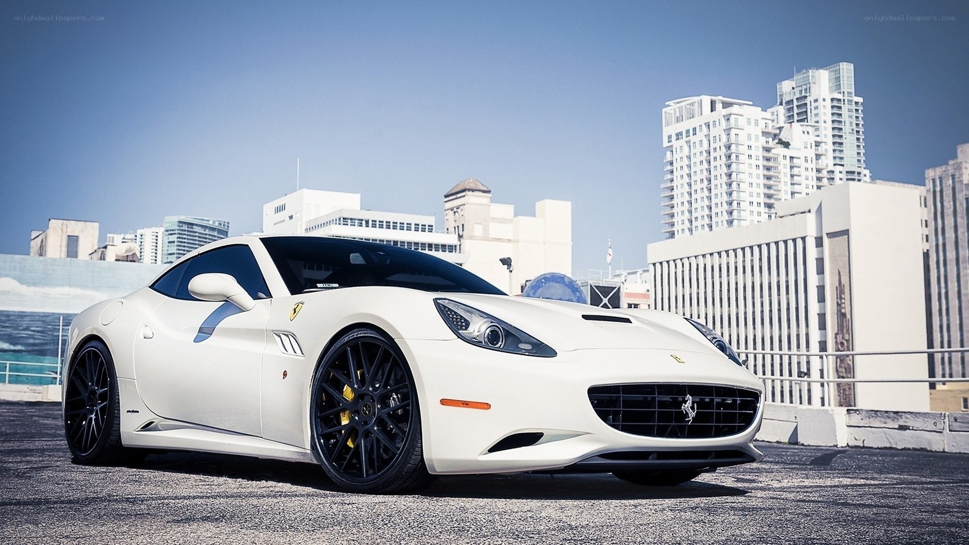 White Ferrari parked in city