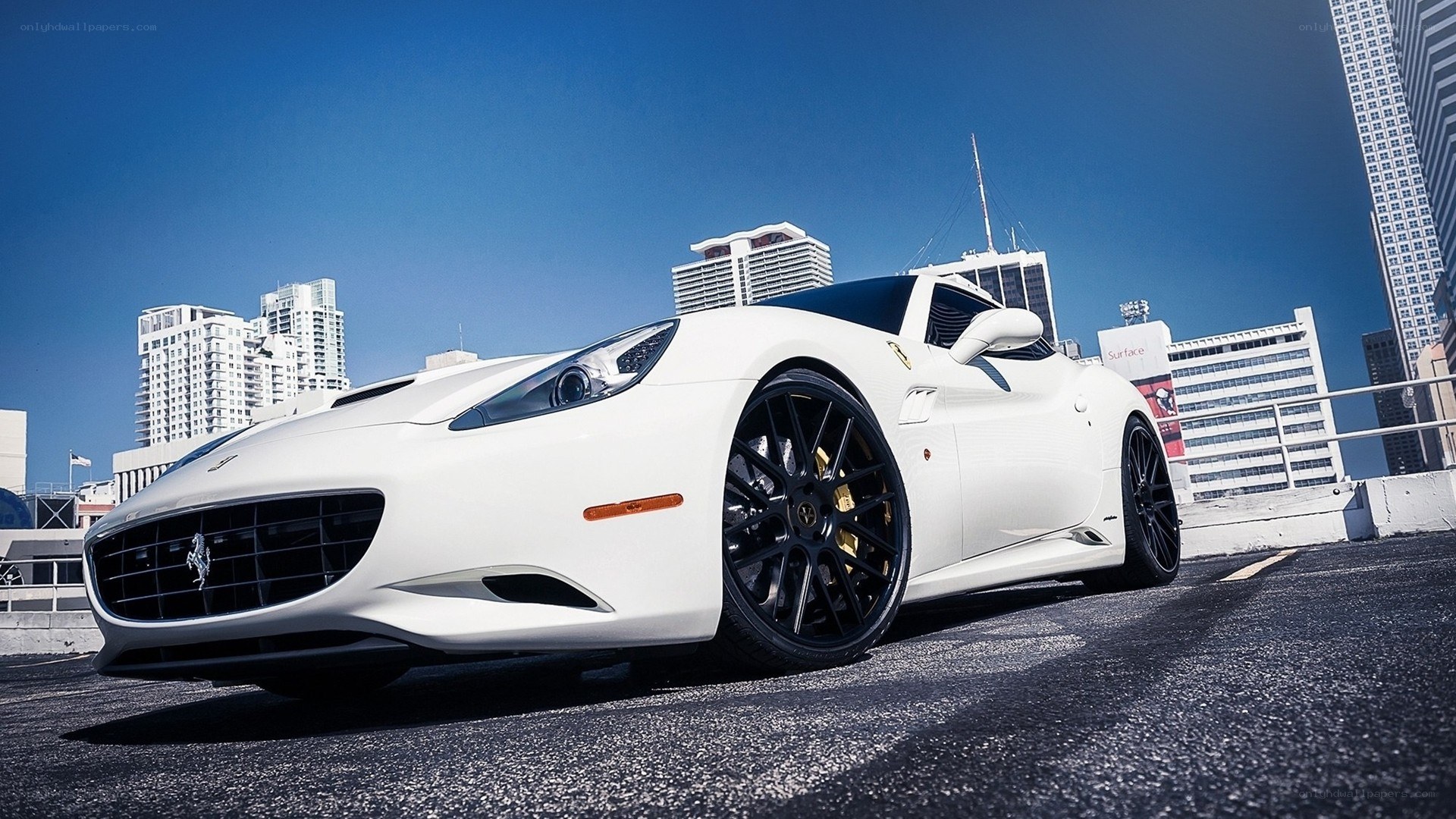 White Ferrari parked in city