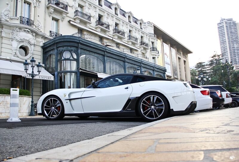 White Ferrari parked on street