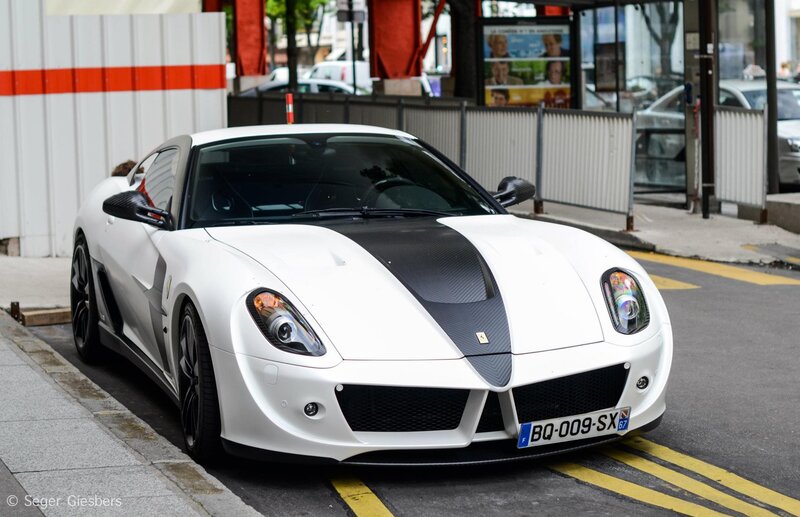 White Ferrari parked on street