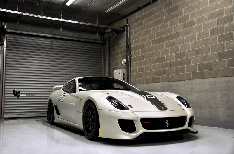 White Ferrari race car in garage