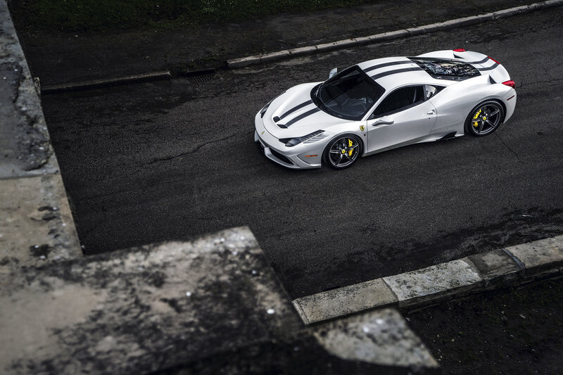 White Ferrari Sports Car — Dramatic, Photograph, Asphalt Road