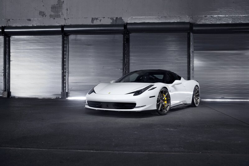 White Ferrari Sports Car — Dramatic, Photograph, Garage Door