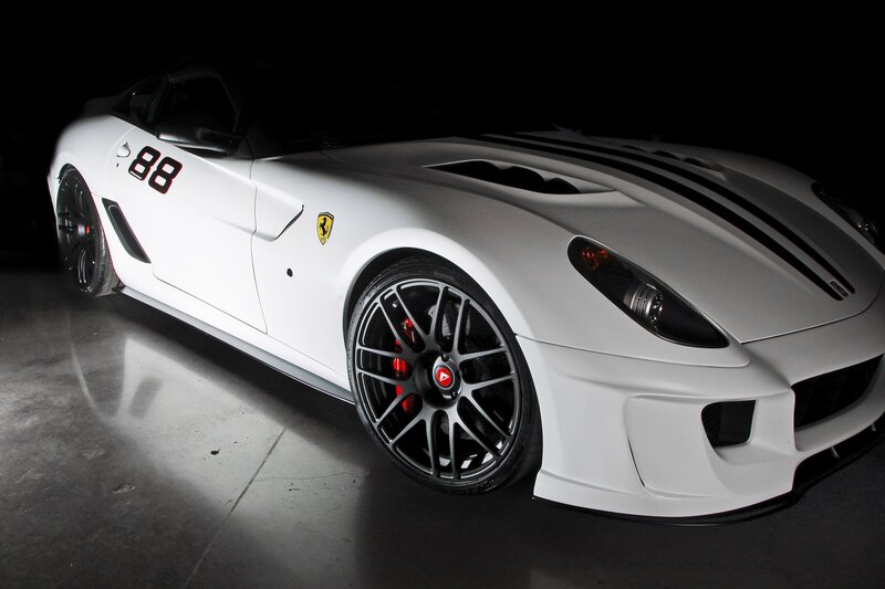 white ferrari with racing stripes