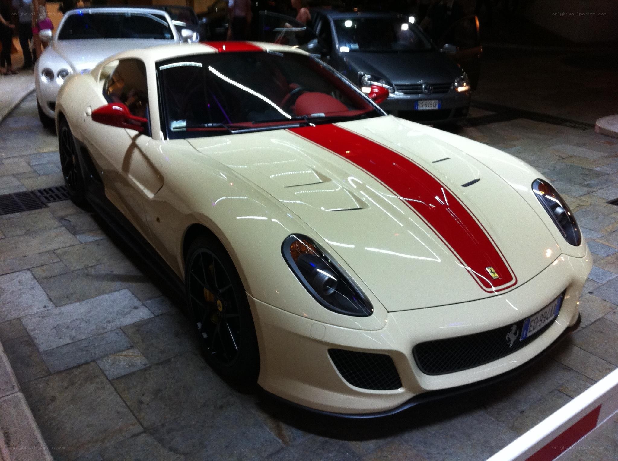 white ferrari with red stripe
