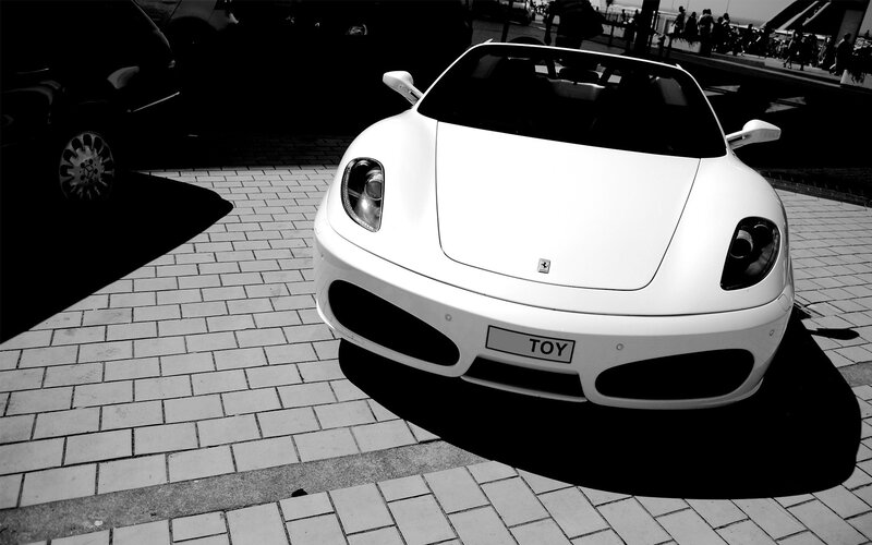 White Ferrari with toy license plate