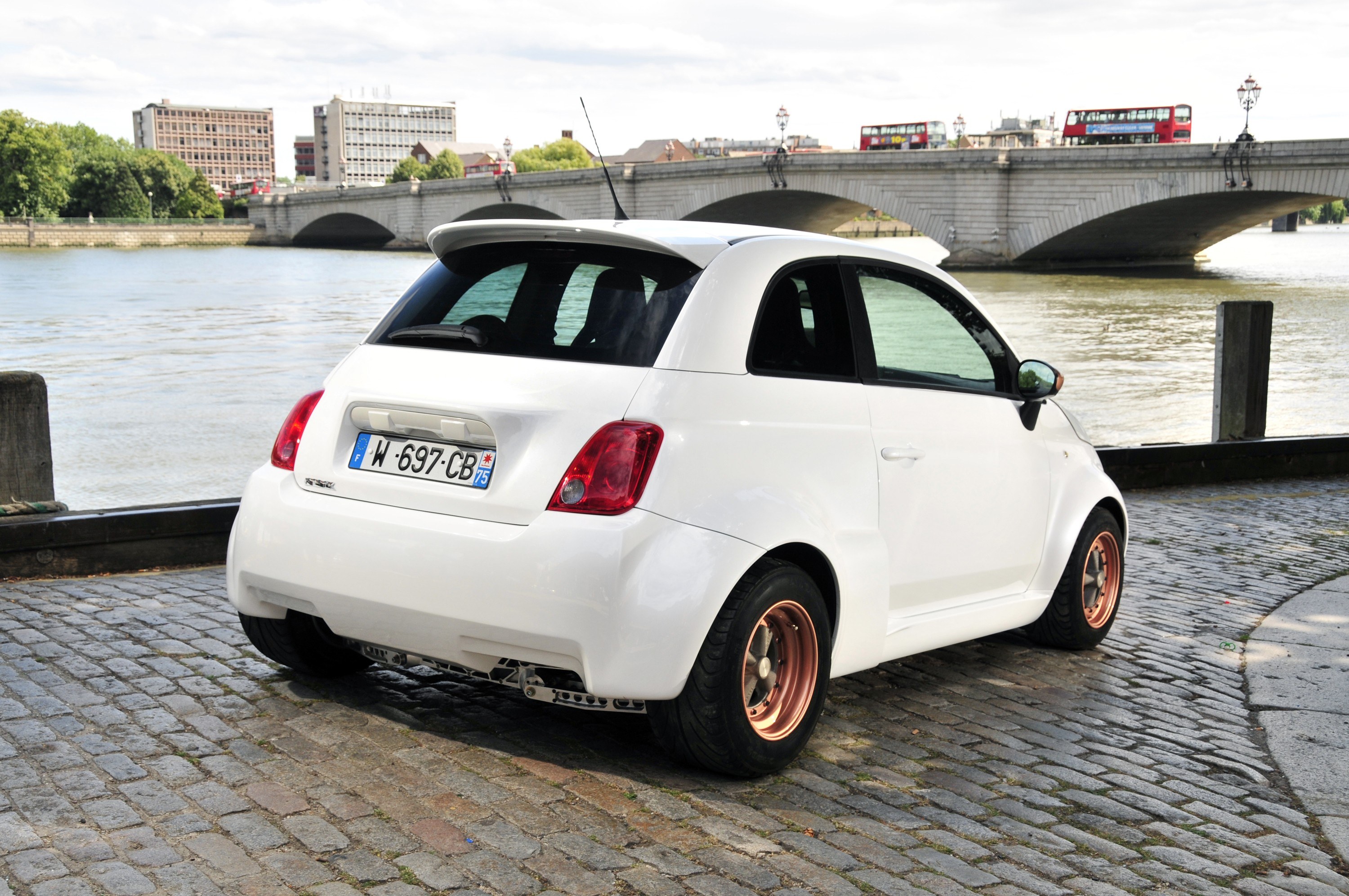 White Fiat 500 by the river