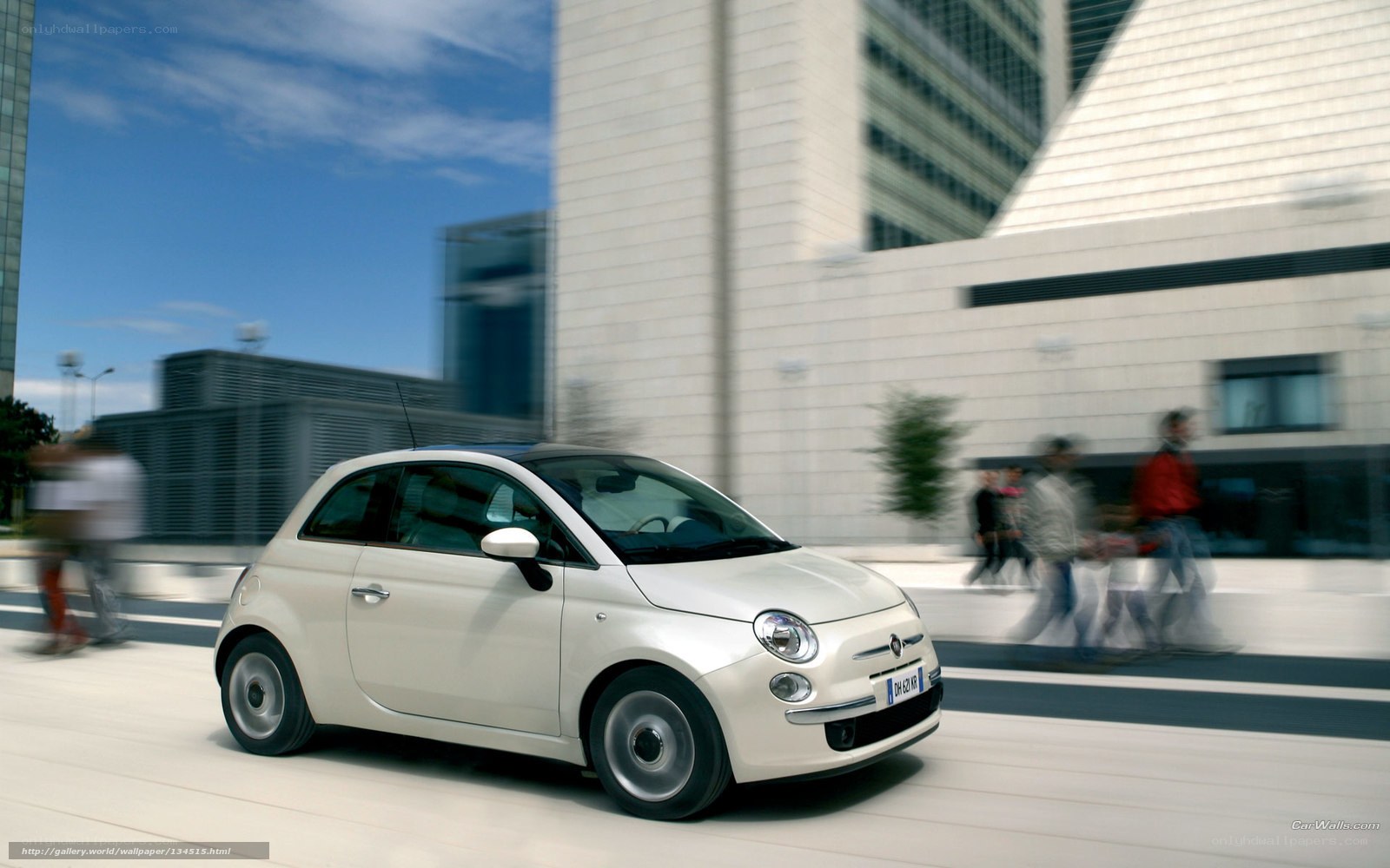 White Fiat 500 in city