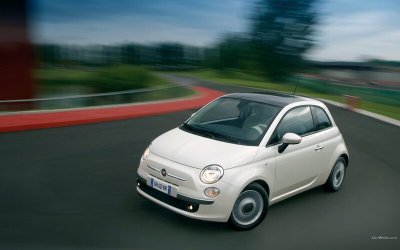White Fiat 500 on a racetrack