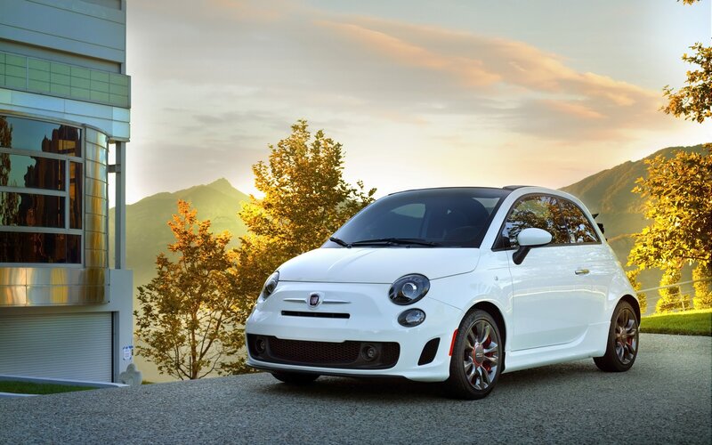 White Fiat 500 parked outside