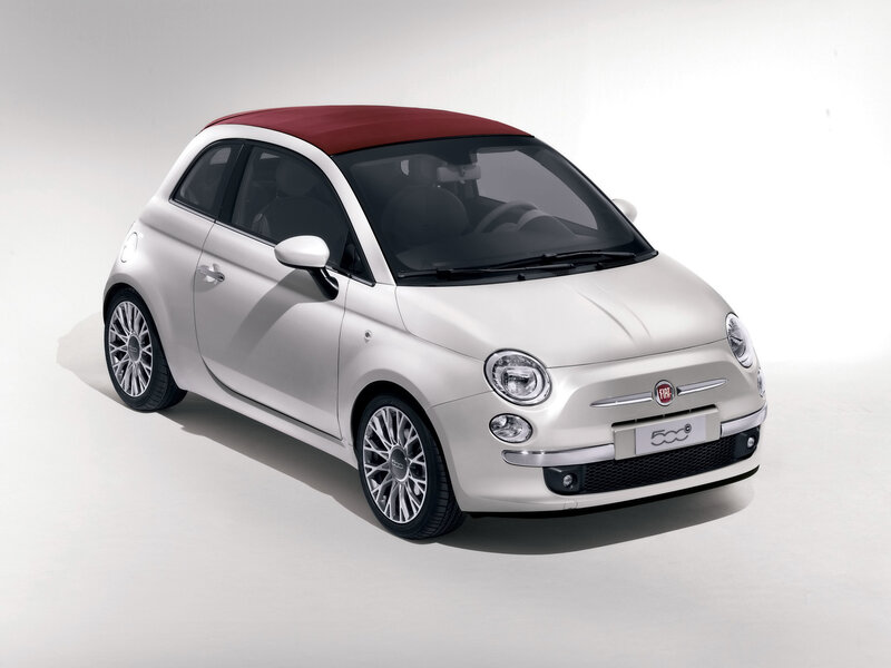 White Fiat 500 with red roof