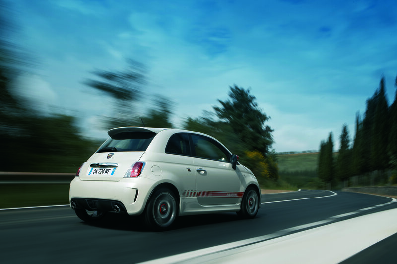 White Fiat Abarth on a winding road