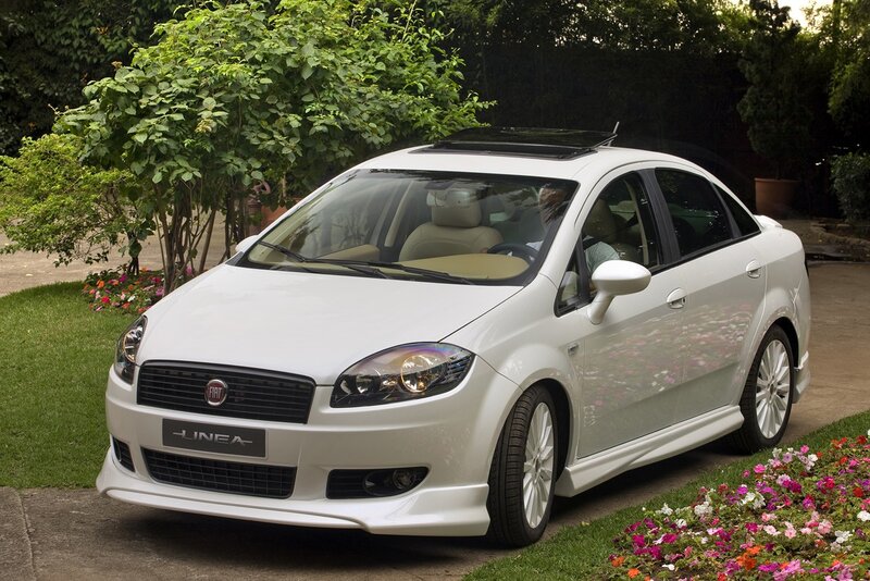 White Fiat Linea Car — Serene