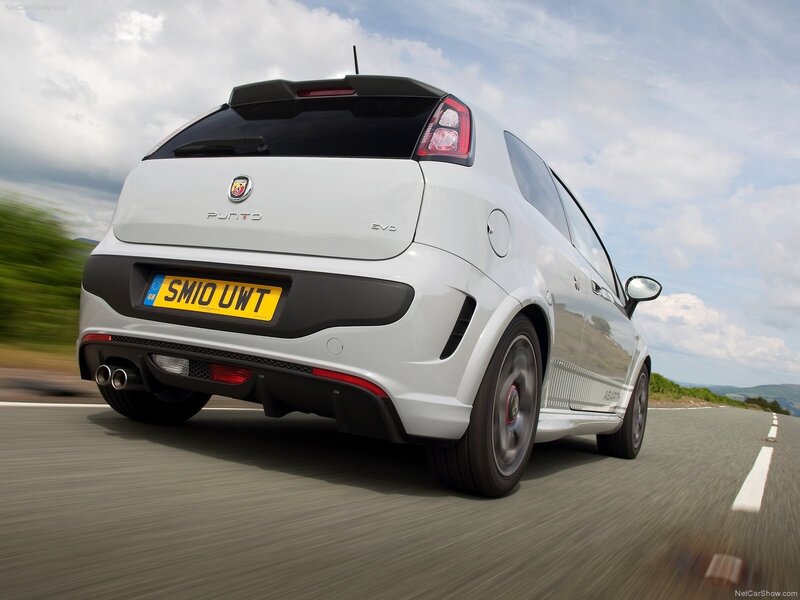 white fiat punto evo in motion