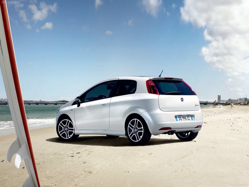 White Fiat Punto on a beach
