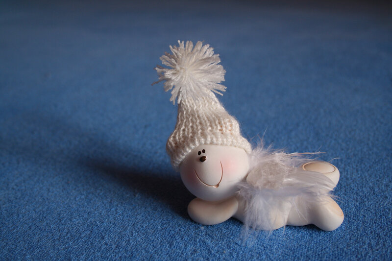 White Figurine with Hat