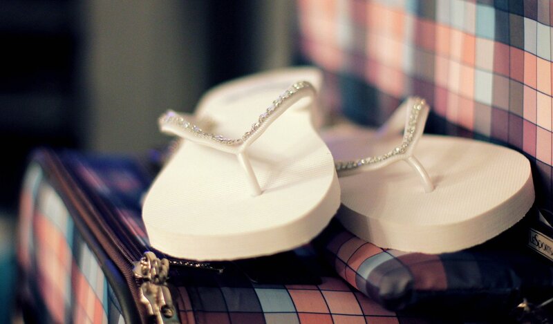 white flip flops with rhinestones