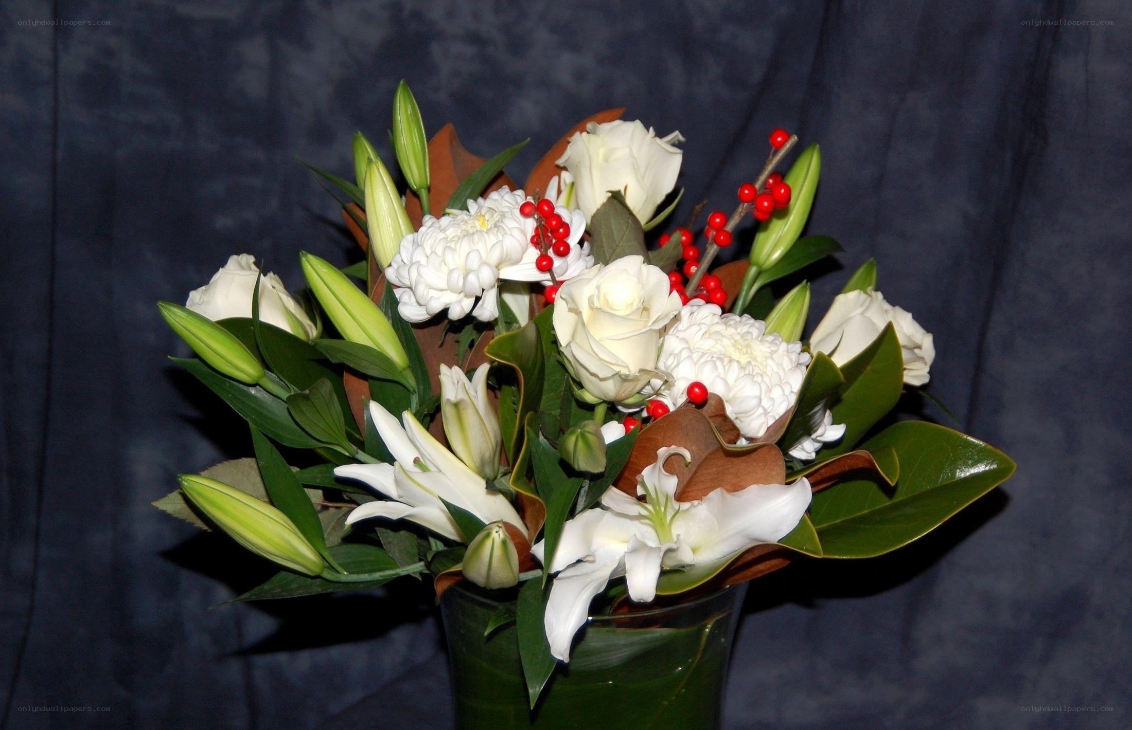 white floral arrangement with berries