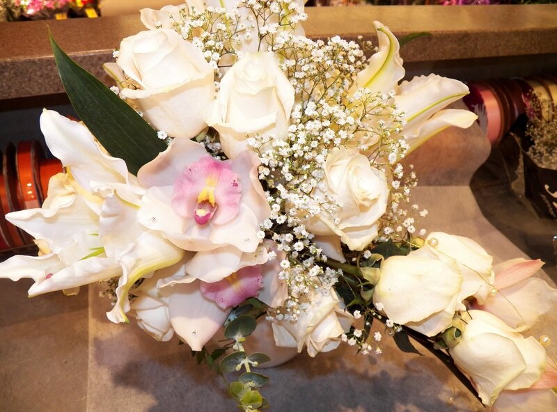 White floral bouquet with orchids
