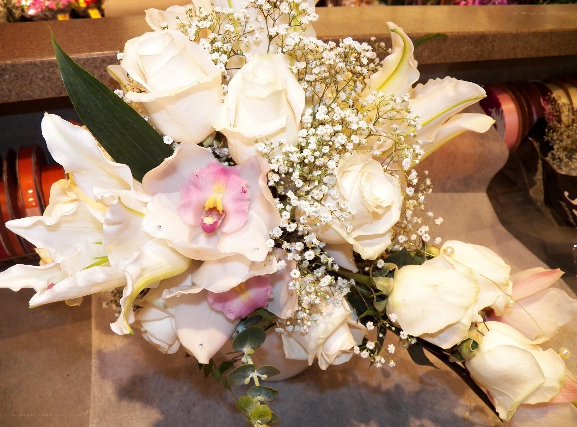 White floral bouquet with orchids