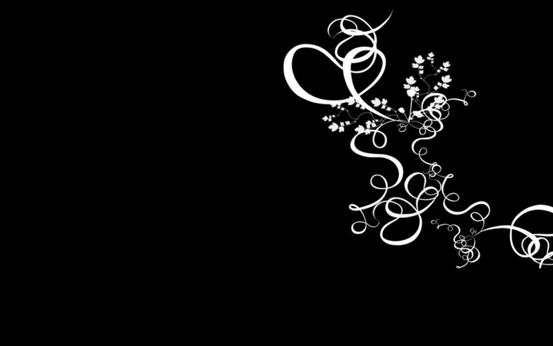 white floral swirls on black